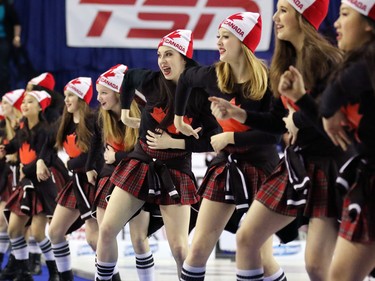 Dancers entertain during the 2015 Tim Horton's Brier semi-final game at the Scotiabank Saddledome on Saturday evening March 7, 2015.