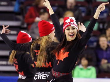 Dancers entertain during the 2015 Tim Horton's Brier semi-final game at the Scotiabank Saddledome on Saturday evening March 7, 2015.