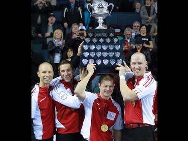 Team Canada hoists the Brier tankard after winning the 2015 Tim Hortons Brier on Sunday March 8, 2015. Team Canada downed Brad Jacobs' Northern Ontario team 6-5 in an extra end.