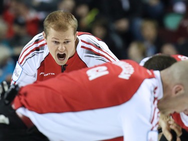 Team Canada second Carter Rycroft yells to his sweepers during the gold medal final of the 2015 Tim Hortons Brier on Sunday March 8, 2015.