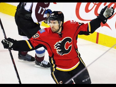 Calgary Flames forward David Jones celebrates scoreing on Colorado Avalanche goaltender Semyon Varlamov during first period NHL action at the Scotiabank Saddledome Monday March 23, 2015.