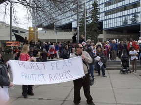 Hundreds of Calgarians gather in front of city hall to protest the Harper government's controversial anti-terror bill, Bill C-51, on March 14, 2015.