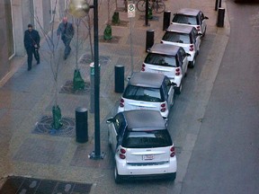 CALGARY, AB; OCTOBER 18, 2013 -- Reader supplied photo that he says photo shows the state of a 30 minute parking zone on 3rd St SW. "Today these 5 car2go vehicles  have sat in this space for over 2 hours that I am aware of. This parking area is almost always filled with Car To Go cars"  says Mark Taylor. (Calgary Herald) For Editorial story by Naomi Lakritz