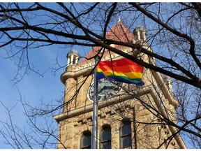 File: The Pride flag flies outside City Hall on March 4, 2015.