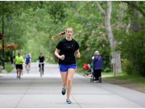 Emily Krywitsky runs along the pathways in Calgary on June 24, 2014.