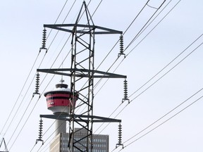 Downtown Calgary is framed by electrical power lines in March 2014.