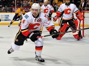 Kris Russell #4 of the Calgary Flames skates against the Nashville Predators during the third period at Bridgestone Arena on March 29, 2015 in Nashville, Tennessee.