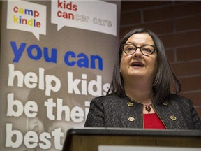 FILE PHOTO: Christine McIver, founder and chief executive officer of Kids Cancer Care Foundation of Alberta, announces their new partnership with the Survive and Thrive Cancer Program in Calgary, on March 12, 2015.