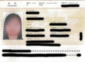 The Canada Border Services Agency issued this heavily redacted image of a passport seized in an immigration fraud case.