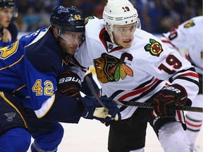 St. Louis' David Backes, left, battles Chicago's Jonathan Toews in the playoffs last year. The Blues bowed out to the Hawks in yet another round of post-season disappointment for the franchise.