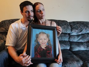 Meika Dawn Jordan's stepfather Brian Woodhouse, left, and mother Kyla Guttman  at their home on December 1, 2011