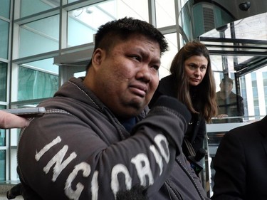 Sarith Khun, 30, talks to media after giving his victim impact statement in the Zuccherato, in Calgary on March 2, 2015.