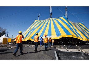 Circus workers and local contractors put up the big tent for the Cirque du Soleil show in Calgary on Tuesday, March 31, 2015.