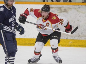Calgary Dinos' Kevin King celebrates scoring the first goal of the game during Game 3 of their Canada West semifinal playoff series against local rival MRU. The Dinos won 6-3 to advance.
