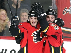 Calgary Flames centre Matt Stajan, left, and left winger Brandon Bollig celebrated after Stajan scored against the Anaheim Ducks during Wednesday's game.