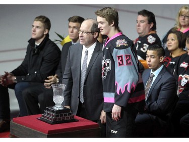 Calgary Hitmen defenceman Travis Sanheim was awarded the top defenceman award prior to the game against the Kootenay Ice in WHL action at the Scotiabank Saddledome on March 22, 2015.