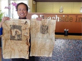 Harvey Robbins, general manager of the Best Western Beach Side Inn in Santa Barbara, Calif., was surprised and delighted to discover Calgary Herald newspapers from January 1953 behind some riser piping in an area under construction on March 4, 2015. Picture taken on March 6, 2015.