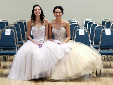 Aliena Kennedy, left, and Brandy Lanz were posing for pictures as they waited for the ball to begin at the High River Spring Ball on March 14, 2015. The Ball follows two months of hard work as the grade 11 students in the community learned proper etiquette, how to behave at a job interview and ballroom dancing.