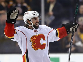 David Schlemko of the Calgary Flames celebrates after scoring the game winning goal during a shootout against the Boston Bruins on March 5, 2015.