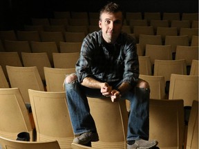 Calgary filmmaker,Trevor Smith, poses at the Globe Cinema.