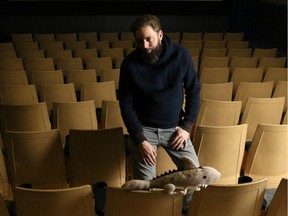 Calgary filmmaker, Spencer Estabrooks poses at the Globe Cinema.
