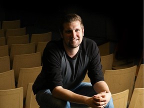 Calgary filmmaker, Kyle Thomas poses at the Globe Cinema.