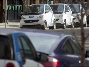 Cars from Car2Go vehicle sharing service  on 8th Avenue SW downtown.