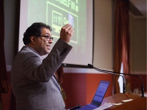 Mayor Naheed Nenshi speaks to the media about the new online census system at City Hall in Calgary on Friday, March 20, 2015.  The online census could save a dollar per household, and the city is aiming for a 40% success rate this year.