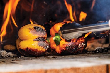 IT takes hours to bring the wood-burning oven to the proper temperature, but once it’s right, it can deliver food for hours. Vegetables can be roasted right on the ashes, and 
pizza with the simplest of toppings is cooked in 
minutes. Whether it’s the food or the 
conversation piece, the oven tends to draw a crowd.