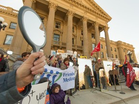 Following Alberta Premier Jim Prentice's comments that Albertans need to take a hard look in the mirror over the province's financial problems, a demonstration was held on the steps of the legislature to hold up mirrors to the building and PC government in Edmonton on March 7, 2015.