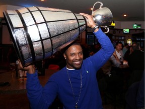 Calgary Stampeders Keon Raymond brought the Grey Cup to watch the Super Bowl game at a Calgary pub. He thinks it should get a Sussex St. reception.