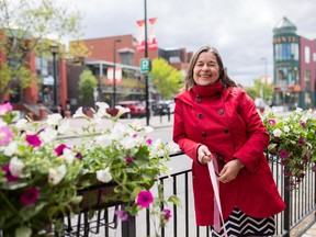 Executive Director of Kensington Business Revitalization Zone, Annie MacInnis is photographed in Kensington in NW Calgary on June 5th, 2014.
