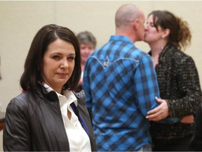 Former Wildrose Party leader Danielle Smith looks on as Okotoks town councillor Carrie Fischer defeats her in the Highwood Progressive Conservative nomination race in High River, Alta. on Saturday, March 28, 2015.