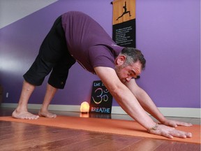 Hart Seinfeld demonstrates the "audo mukha svanasana" - downward facing dog.