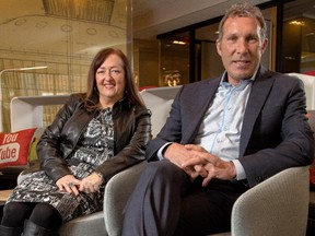 Tina Mitchell, left, and Doug Martineau pose in the new Haworth showroom on 5th Ave in Calgary on March 14, 2015.