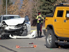 A Calgary Police Traffic Unit member investigates a serious collision in which a pedestrian was hit twice while crossing Beddington Boulevard NE.