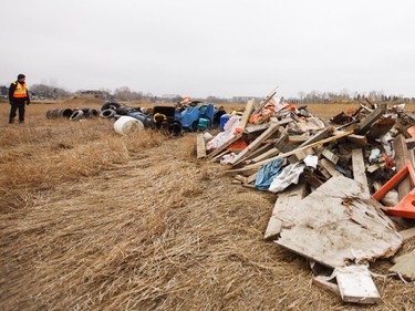 Garbage  was sorted and dumped in a pile at the Inglewood Bird Sanctuary in Calgary on Monday, March 23, 2015.