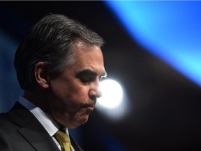 Alberta Premier Jim Prentice pauses as he speaks during the Manning Networking Conference in Ottawa on March 6, 2015.