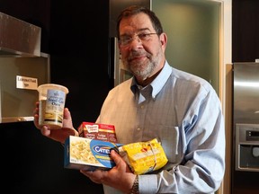 Rabbi Shaul Osadchey clears his home of leavened bread. During Passover, Jewish people will not eat leavened bread, and the Rabbi will sign a contract with Mayor Naheed Nenshi to 'buy' all leavened bread until after the Passover, in Calgary on March 30, 2015.