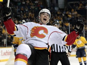 Calgary Flames left winger Michael Ferland celebrates after scoring a goal against the Nashville Predators in the second period on Sunday. The Flames pulled off a 5-2 win to climb back into a playoff position.