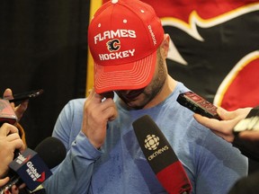 Calgary Flames captain Mark Giordano talks to local media at the Scotiabank Saddledome about his injury.