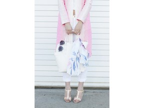 This all-white look at Nordstrom Chinook Centre, shines with a soft pop of pink, expertly combining two of this season's biggest trends — pastels and white — worn head-to-toe. 

Coat: St. John, $1,660; jeans: Frame Denim, $270; sandals: SJP $431; bag: Jimmy Choo, $1,975; scarf: Vince Camuto, $52; sunglasses: Steve Madden, $38.
