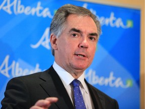 Alberta Premier Jim Prentice speaks with the media following a luncheon speech to the Rotary Club at the Palliser Hotel on Tuesday March 3, 2015.