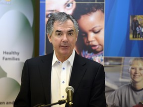 Premier Jim Prentice at the Norwood Child and Family Resource Centre makes an announcement about supports for working families in Edmonton on Friday, March 27, 2015.