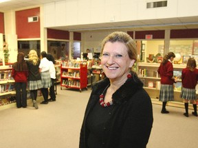 Principal Judi Hadden in the library at the Calgary Girls School