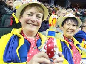 Curling fans Maureen Brazel, left, and Lynda Rumsey get set to watch the gold medal final of the 2015 Tim Hortons Brier on Sunday, March 8, 2015.