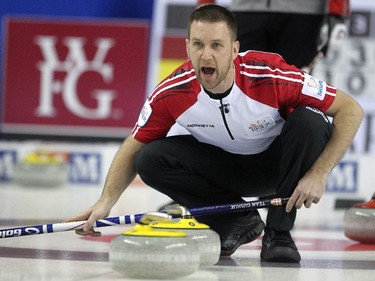 Newfoundland/Labrador skip Brad Gushue called to his sweepers as he watched from the house during their game against the Northwest Territories at the Tim Hortons Brier on Sunday.