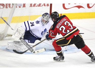 Calgary Flames centre Sean Monahan unleashed a shot to score on Toronto Maple Leafs goalie James Reimer during first period NHL action at the Scotiabank Saddledome on March 13, 2015. It was one of four opening period goals by the Flames.