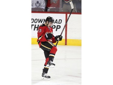 Calgary Flames left winger Johnny Gaudreau celebrated after scoring against the Toronto Maple Leafs during first period NHL action at the Scotiabank Saddledome on March 13, 2015.