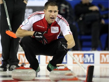 Colleen De Neve/ Calgary Herald CALGARY, AB --MARCH 1, 2015 -- Team Canada skip John Morris called to his sweepers during their game against PEI at the Tim Hortons Brier at the Scotiabank Saddledome on March 1, 2015. (Colleen De Neve/Calgary Herald) (For Sports story by ) 00060855B SLUG: 0302-Brier